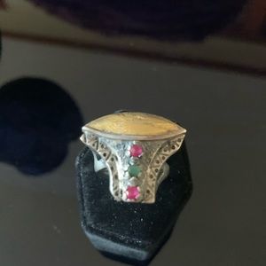 Gold and Silver ring with raw Rubies and Emeralds.